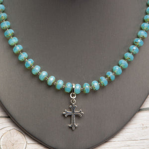 Jennifer’s Aqua Czech Glass Cross Necklace