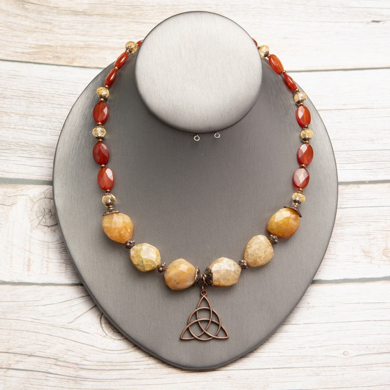 Jennifer’s Carnelian and Yellow Jade Trinity Knot Necklace