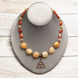 Jennifer’s Carnelian and Yellow Jade Trinity Knot Necklace