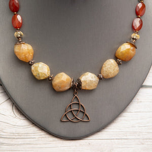 Jennifer’s Carnelian and Yellow Jade Trinity Knot Necklace