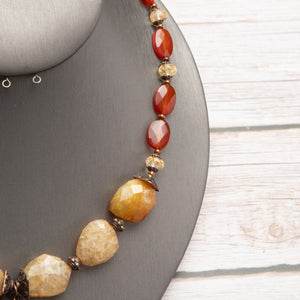 Jennifer’s Carnelian and Yellow Jade Trinity Knot Necklace