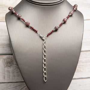 Jennifer’s Garnet Cross Necklace and Earring Set