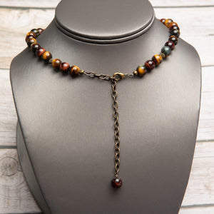 Jennifer’s Multi-Tone Tiger Eye Trinity Knot Necklace