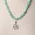 Jennifer's Soft Green Moonstone Trinity Knot Necklace
