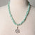 Jennifer's Soft Green Moonstone Trinity Knot Necklace