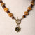Jennifer's Swirl Glass and MOP Trinity Rose Necklace and Earring Set