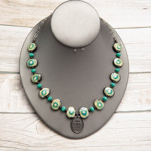 Jennifer’s Teal Ceramic Cross Necklace