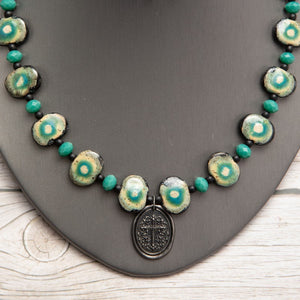 Jennifer’s Teal Ceramic Cross Necklace