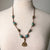 Jennifer's Unisex Leather and Ceramic Trinity Knot Necklace