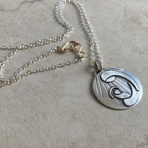 Kathy’s Handcrafted Baby Jesus and Mary Necklace