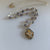 Kathy’s Handcrafted Silver and Gold Cross with Semi-precious Beads