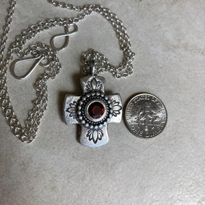 Kathy’s Handcrafted Silver Cross with Red Gemstone