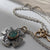 Kathy's Handcrafted Mixed Metal Cross Necklace with Roman Glass