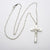 Kelly's Plain White Enameled Crucifix Necklace