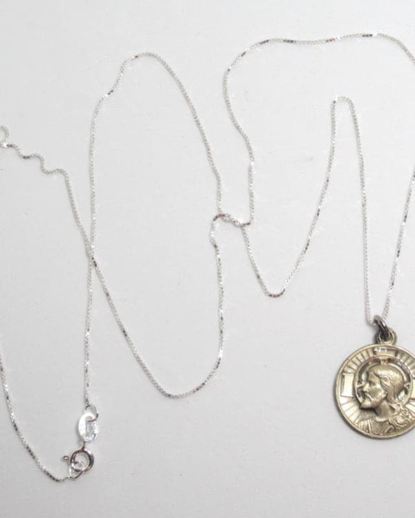 Kelly's Sterling Vintage Jesus Medal Necklace