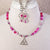 Jennifer’s Fuscia Banded Agate Trinity Knot Necklace and Earring Set